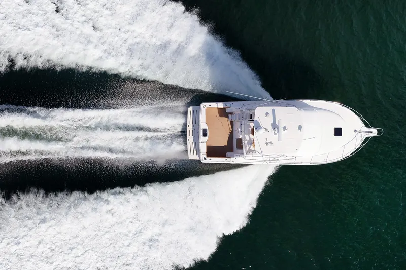 Slide: The Image of Aerial view of 2007 Tiara Yachts 3900 Convertible speeding on water. - 43