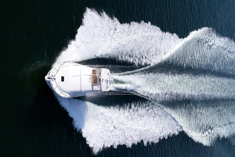 Slide: The Image of Tiara Yachts 2007 3900 Convertible cruising on open water, aerial view. - 44