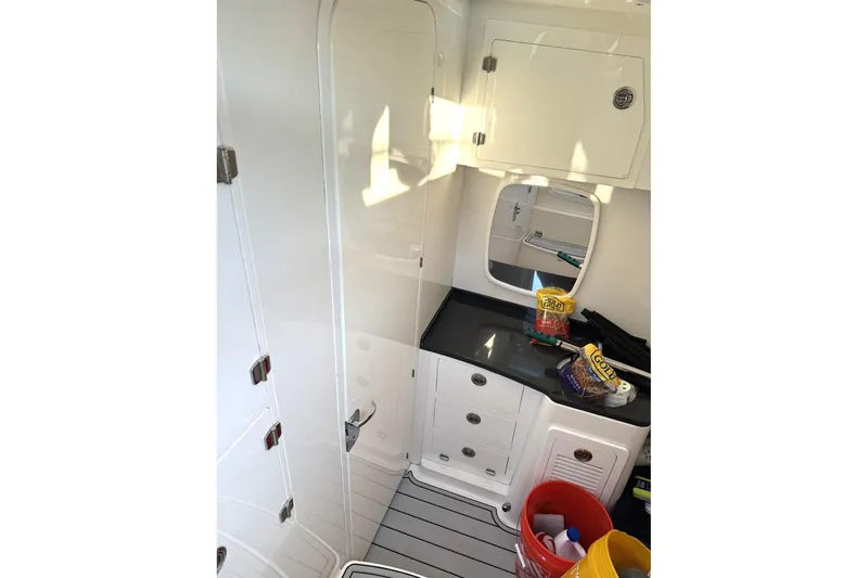 Slide: The Image of Interior of 2019 HCB 39 Speciale boat with storage cabinets and countertop. - 17