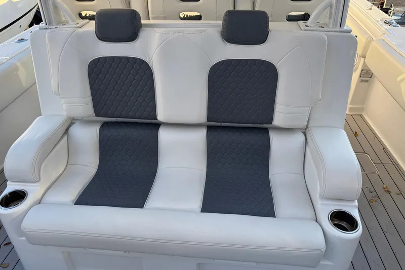 Slide: The Image of Luxury seating on 2019 HCB 39 Speciale boat with quilted upholstery and cup holders. - 23