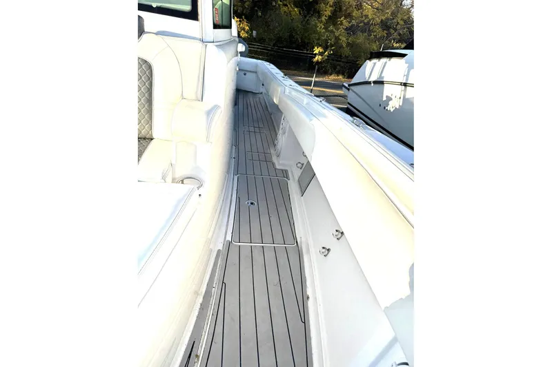 Slide: The Image of 2019 HCB 39 Speciale boat deck with white seating and sleek design. - 31