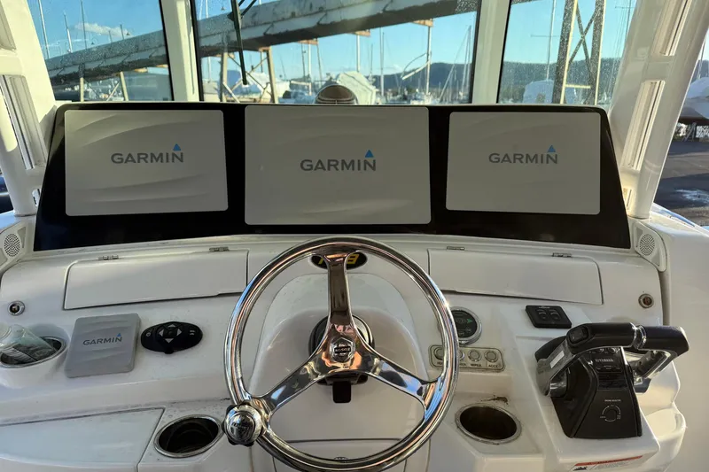 Slide: The Image of 2019 HCB 39 Speciale helm with Garmin displays and steering wheel. - 4