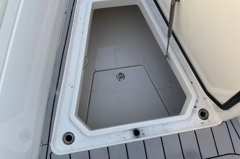 Slide: The Image of Open storage compartment on 2019 HCB 39 Speciale boat deck. - 9
