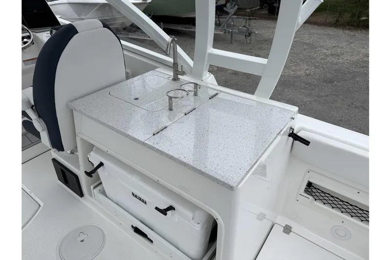 Slide: The Image of 2026 Sea Fox 268 Traveler boat interior with sleek countertop and integrated sink. - 15