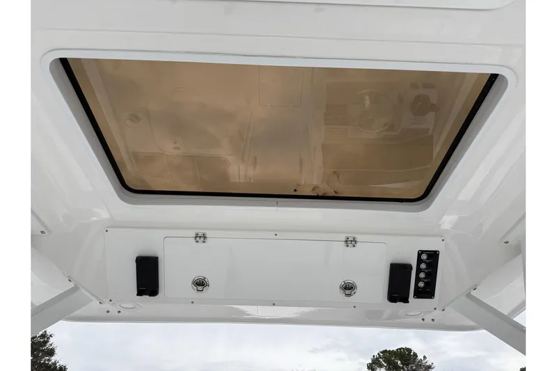 Slide: The Image of 2026 Sea Fox 268 Traveler boat roof with hatch and control panel. - 22