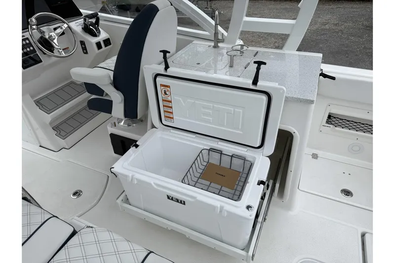 Slide: The Image of Interior of 2026 Sea Fox 268 Traveler with YETI cooler and helm station. - 25
