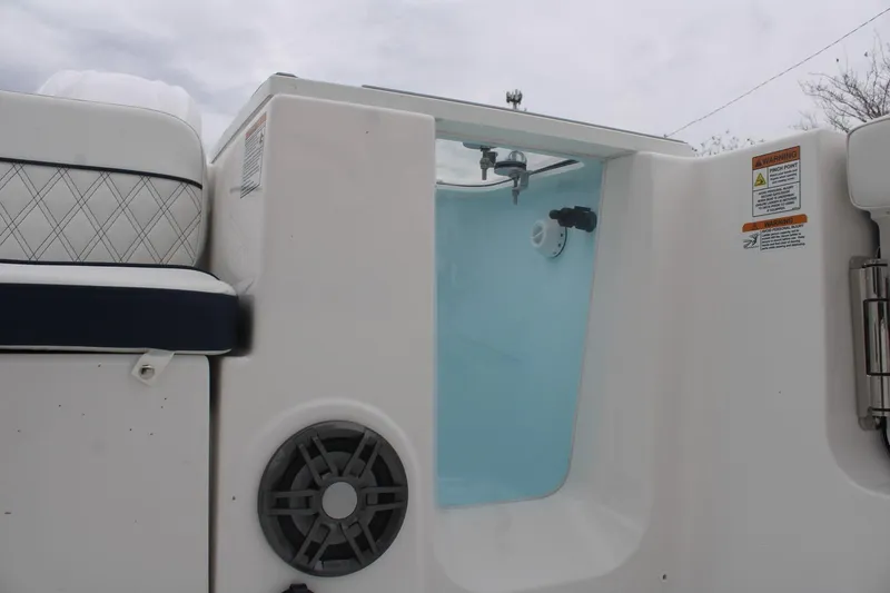 Slide: The Image of 2026 Sea Fox 268 Traveler boat interior with seating and storage compartment. - 9