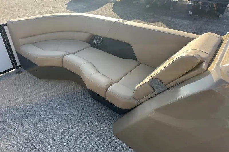 Slide: The Image of Luxurious seating on 2026 Evotti 523CS boat, featuring beige upholstery and modern design. - 11
