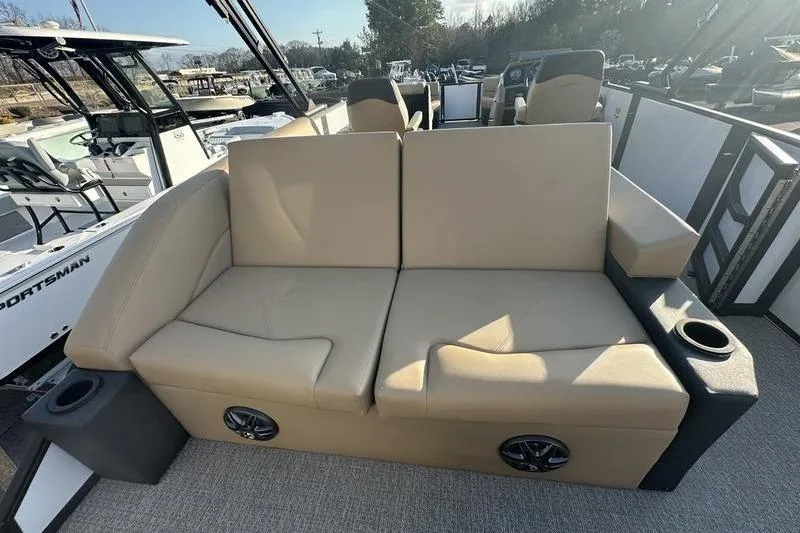 Slide: The Image of Luxurious seating on 2026 Evotti 523CS boat with cup holders and speakers. - 18