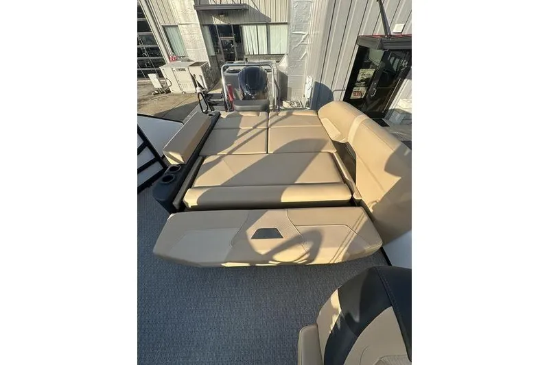 Slide: The Image of 2026 Evotti 523CS boat interior with beige seating and modern design. - 19