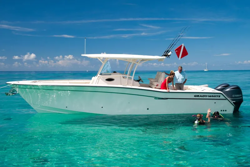 Slide: The Image of Manufacturer Provided Image: 2016 Grady-White Canyon 336 boat on clear turquoise water with people snorkeling. - 3