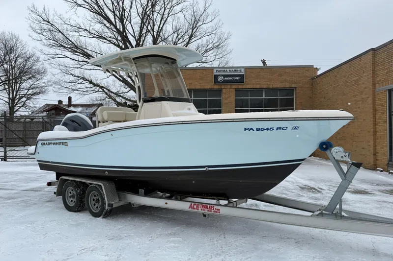 The Image of 2023 Grady-White Fisherman 216 boat on trailer in snowy setting. - 1