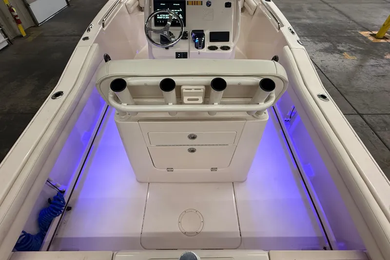 Slide: The Image of 2023 Grady-White Fisherman 216 boat interior with illuminated deck and control console. - 10