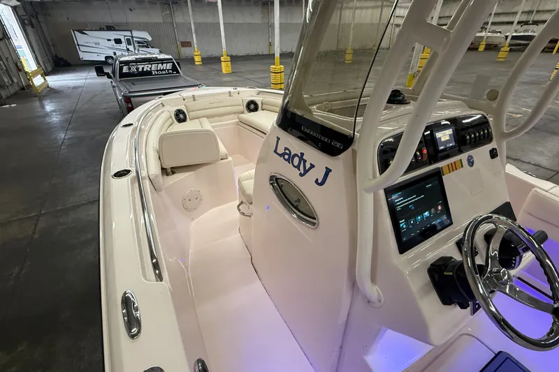 Slide: The Image of 2023 Grady-White Fisherman 216 boat interior with steering console and seating. - 28