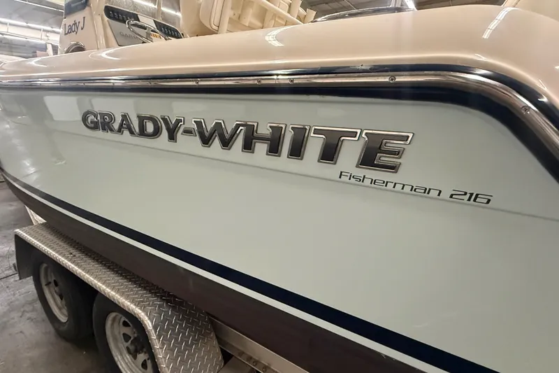 Slide: The Image of 2023 Grady-White Fisherman 216 boat on trailer in indoor setting. - 4