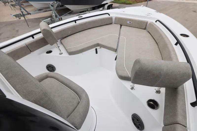 Slide: The Image of 2026 Sea Hunt Ultra 235 SE boat interior with cushioned seating and modern design. - 3