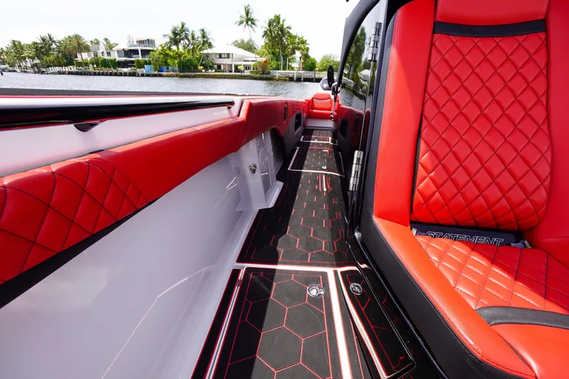 Slide: The Image of 2020 Statement 380 Open boat with red quilted seats. - 18