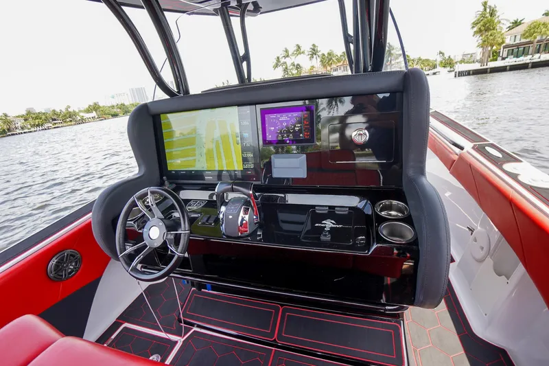 Slide: The Image of Interior view of 2020 Statement 380 Open boat with modern helm console. - 24