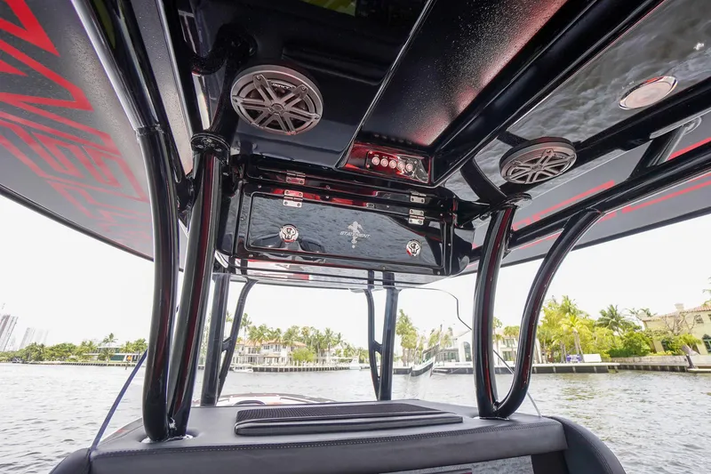Slide: The Image of 2020 Statement 380 Open boat interior with speakers. - 26