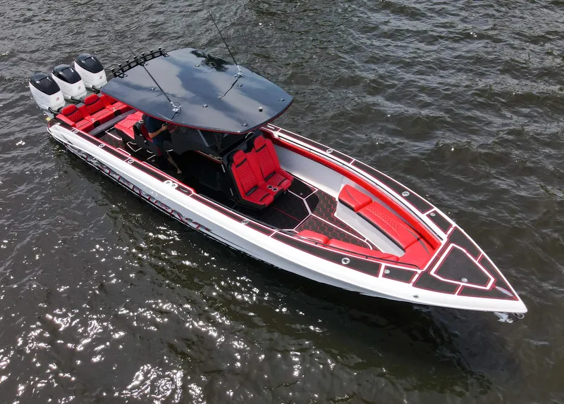 Slide: The Image of 2020 Statement 380 Open boat on the water. - 3