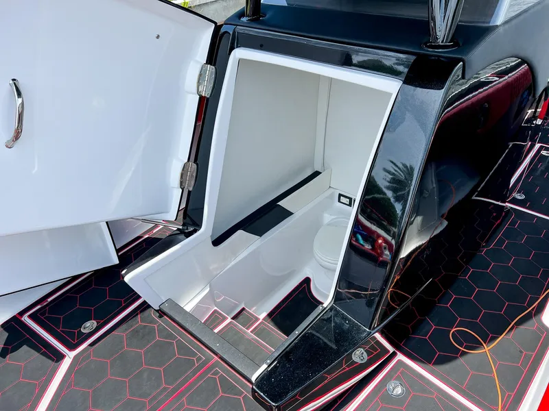 Slide: The Image of Open storage compartment on a 2020 Statement 380 Open boat. - 32