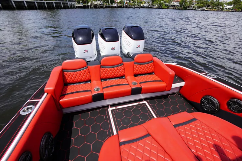 Slide: The Image of Luxurious Statement 380 Open boat, red seating, three engines, 2020 model. - 9