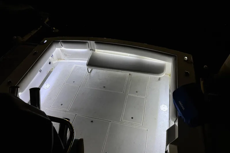 Slide: The Image of 1991 Wellcraft boat deck illuminated at night with LED lights. - 27