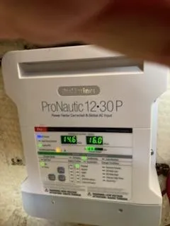 Slide: The Image of ProNautic 12:30 P power converter display on a 1991 Wellcraft 3300 Sport Bridge. - 31