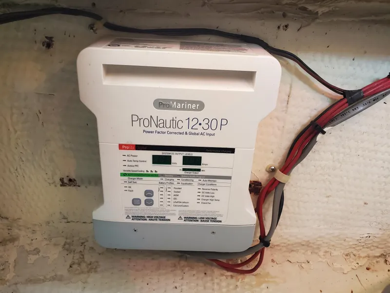Slide: The Image of ProMariner ProNautic 12:30 P charger installed on 1991 Wellcraft 3300 Sport Bridge. - 32