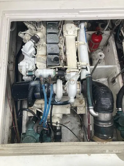 Slide: The Image of Engine compartment of a 1991 Wellcraft 3300 Sport Bridge boat. - 38