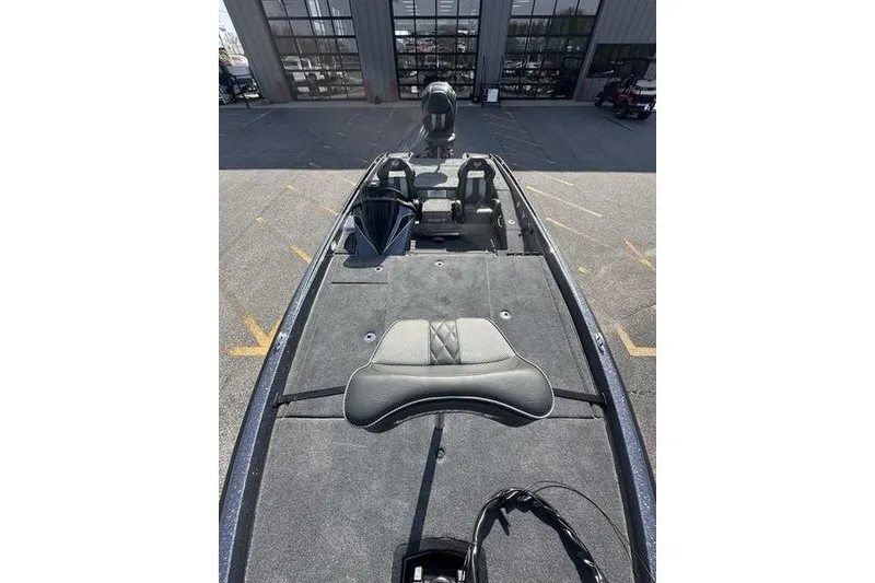 Slide: The Image of 2026 Phoenix 921 Elite X boat interior with seating and spacious deck. - 14