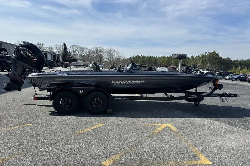Slide: The Image of 2026 Phoenix 921 Elite X boat on trailer in parking lot. - 8