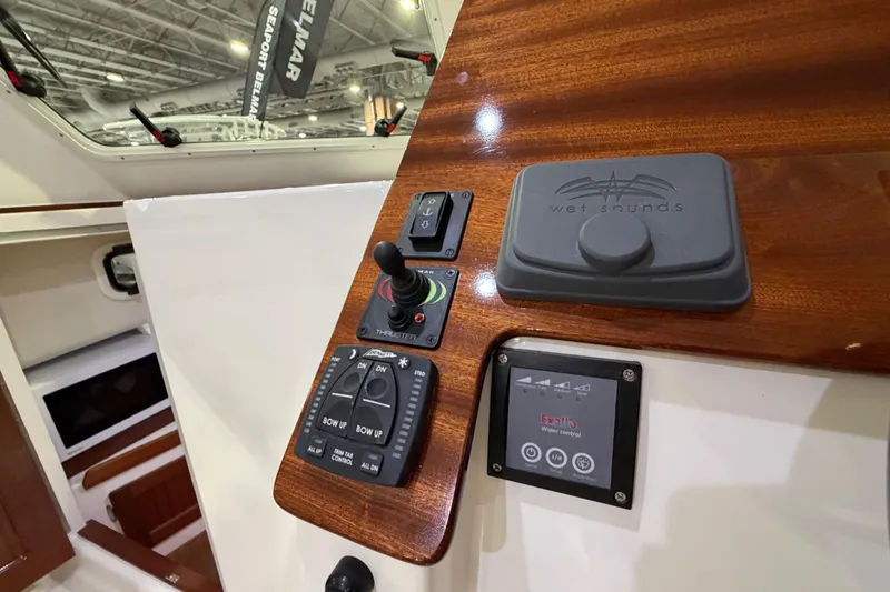 Slide: The Image of Control panel of 2026 NorthCoast 255 Cabin boat with joystick and audio system. - 7