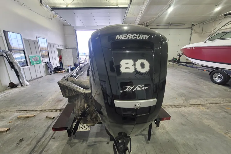 Slide: The Image of Outboard motor in garage, Mercury 80 Jet Power, 2023 Havac FRRSC boat. - 11