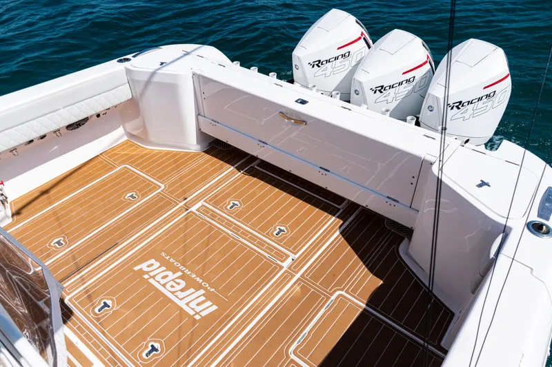 Slide: The Image of 2018 Intrepid 438 Evolution boat deck with triple Racing 450 engines. - 33