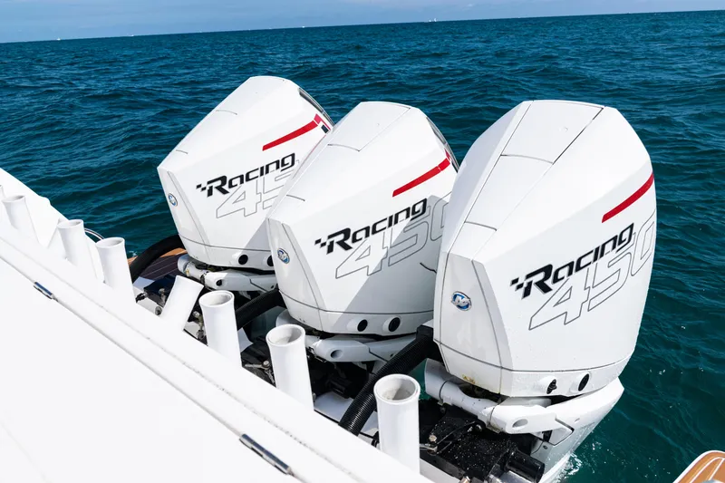 Slide: The Image of Triple Mercury Racing 450 engines on 2018 Intrepid 438 Evolution boat in open sea. - 36