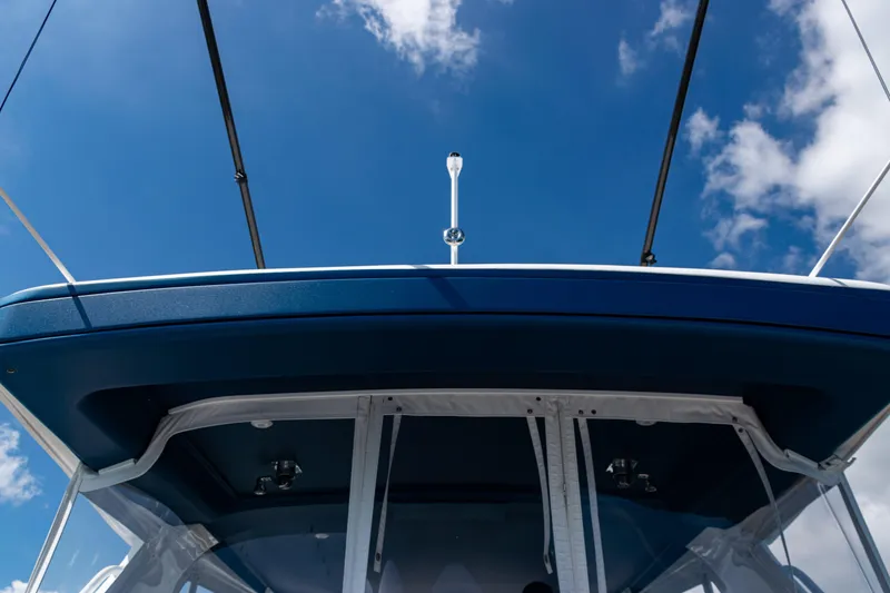 Slide: The Image of 2018 Intrepid 438 Evolution boat against a clear blue sky. - 37