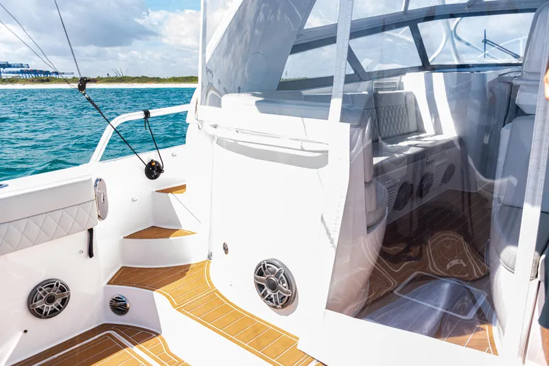 Slide: The Image of 2018 Intrepid 438 Evolution boat interior with sleek design and ocean view. - 45