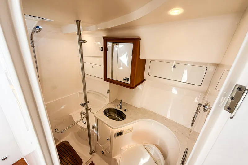 Slide: The Image of Luxurious bathroom interior of 2018 Intrepid 438 Evolution yacht, featuring modern fixtures and elegant design. - 46