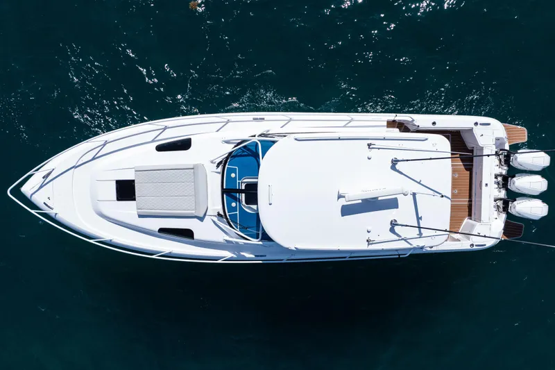 Slide: The Image of Aerial view of 2018 Intrepid 438 Evolution yacht on blue water. - 9