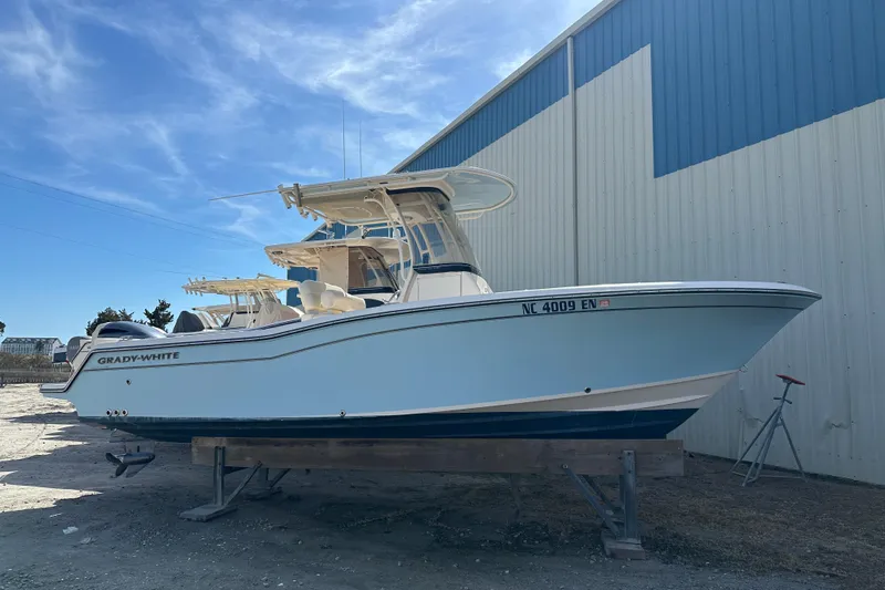 The Image of 2020 Grady-White Fisherman 236 boat on dry dock, side view. - 0