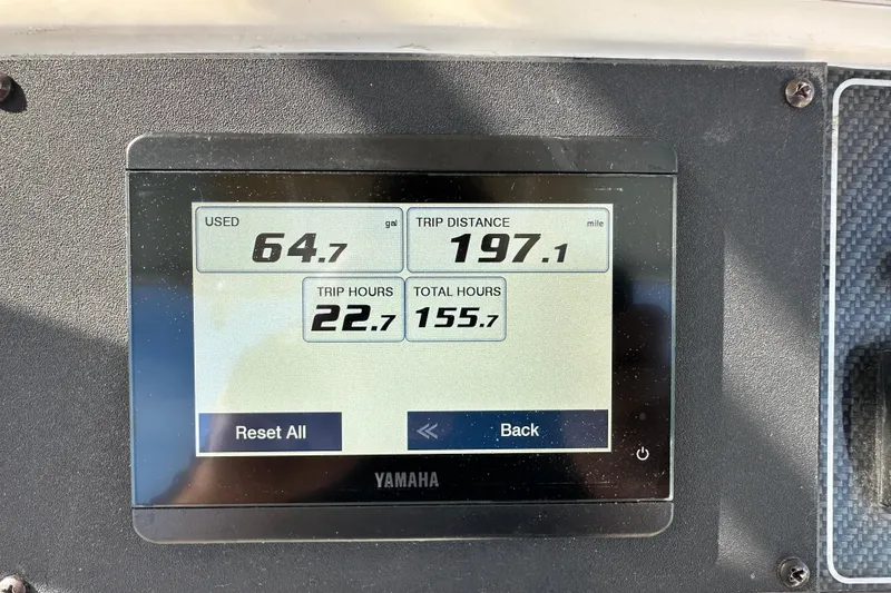 Slide: The Image of Display screen showing fuel usage, trip distance, and hours for 2020 Grady-White Fisherman 236. - 15
