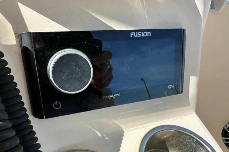 Slide: The Image of Fusion audio system on 2020 Grady-White Fisherman 236 boat dashboard. - 17