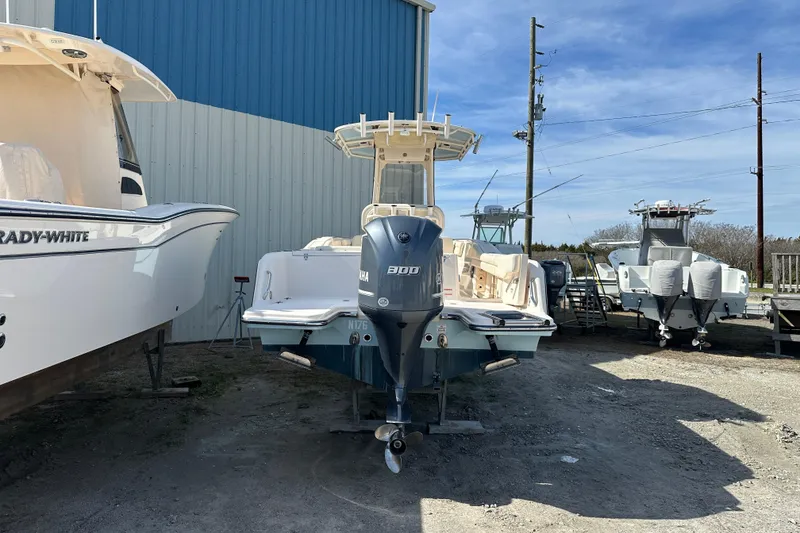 Slide: The Image of 2020 Grady-White Fisherman 236 boat with Yamaha engine, parked outdoors. - 7