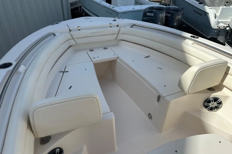 Slide: The Image of 2020 Grady-White Fisherman 236 boat on display under a clear blue sky. - 8