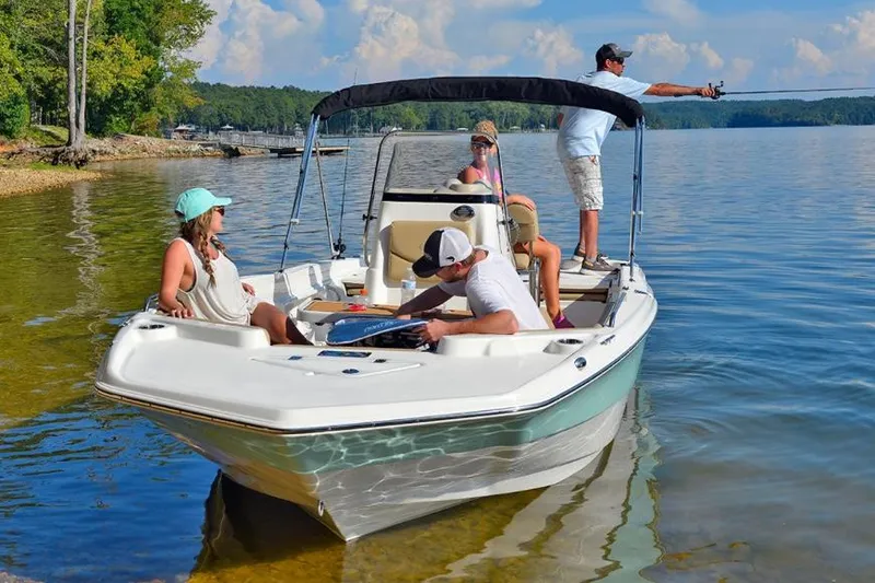 Slide: The Image of Manufacturer Provided Image: 2021 NauticStar 211 Hybrid boat with people fishing and relaxing on a lake. - 5