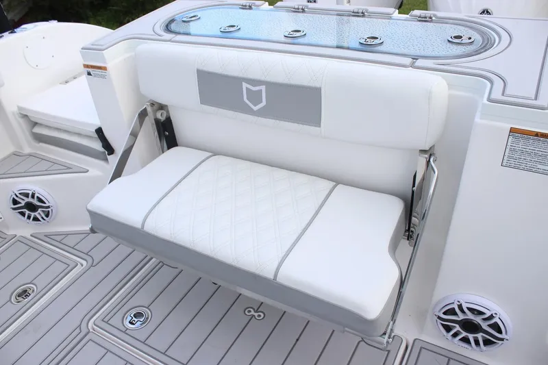 Slide: The Image of 2026 Sea Fox 288 Commander boat interior with cushioned seating and modern design. - 11