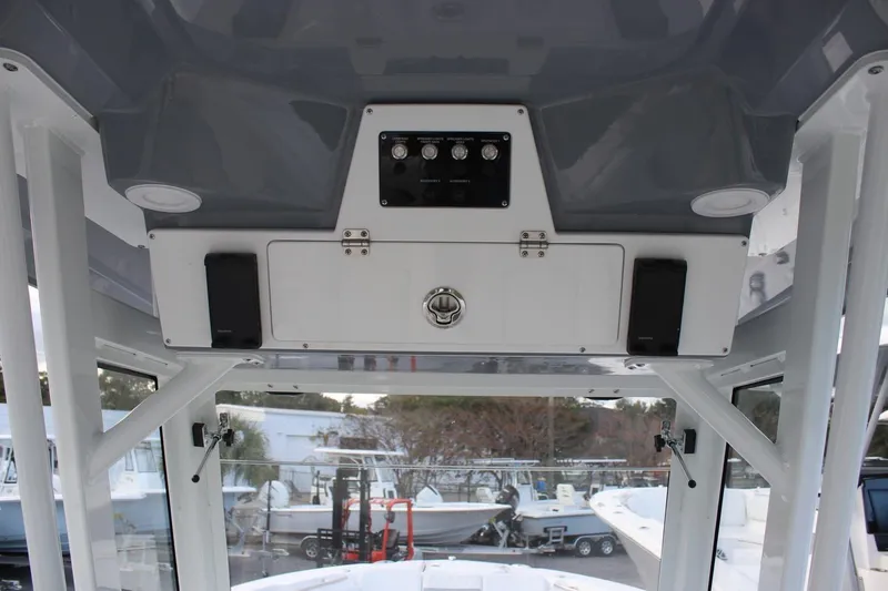 Slide: The Image of Interior view of 2026 Sea Fox 288 Commander boat console with speakers and controls. - 5