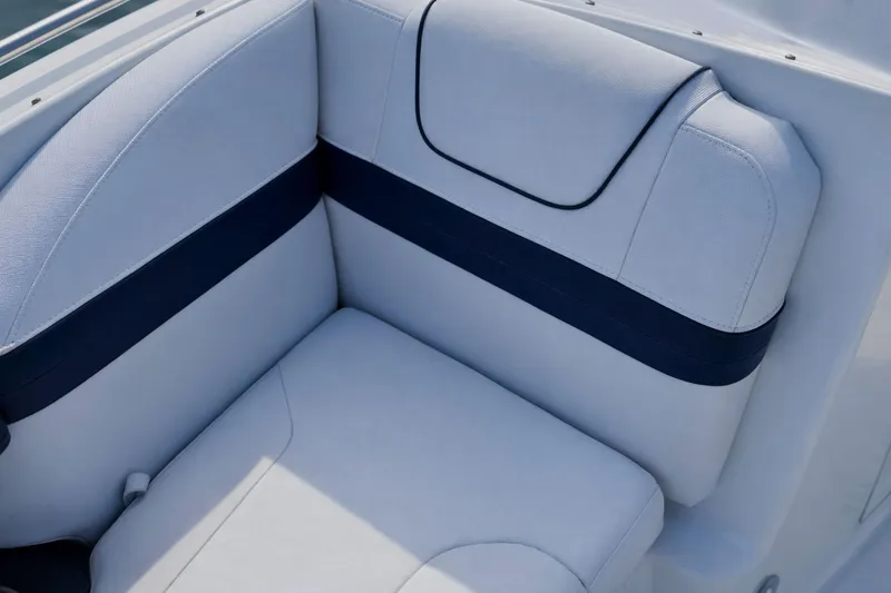 Slide: The Image of 2015 Formula 240 Bowrider interior with cushioned seating and cup holders. - 14