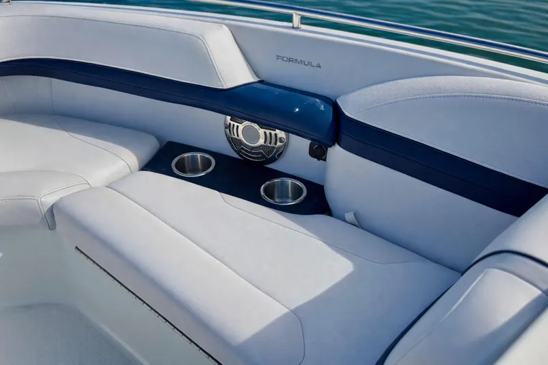 Slide: The Image of Open storage compartment on 2015 Formula 240 Bowrider boat, with ocean in background. - 15